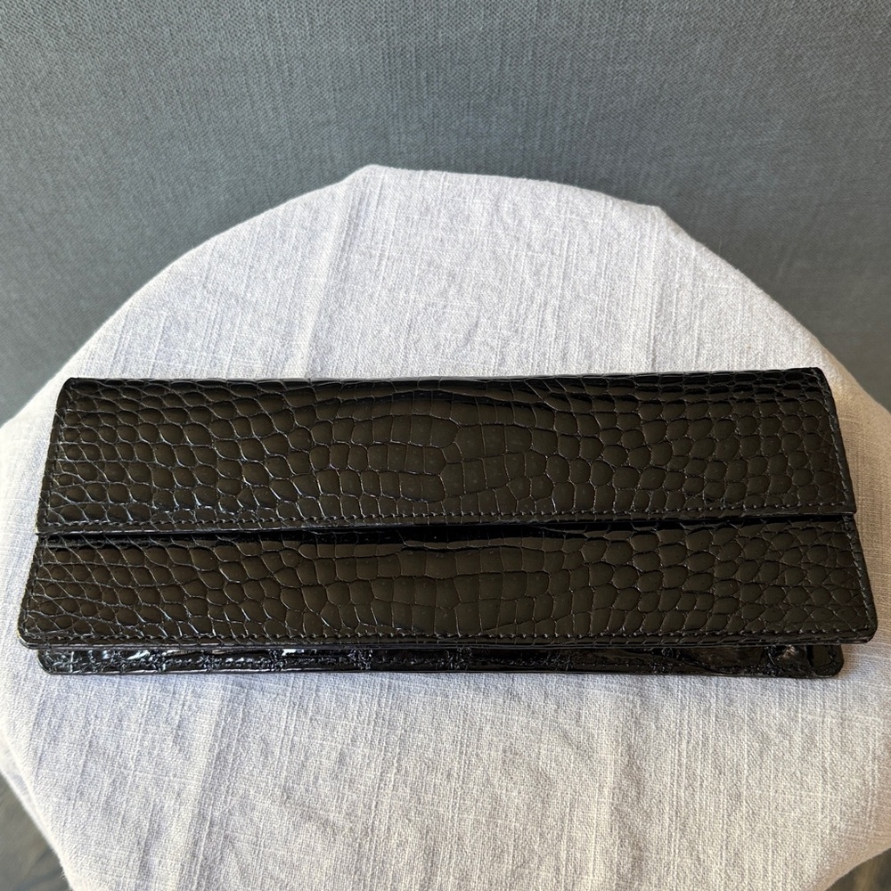 Leather clutch, embossed